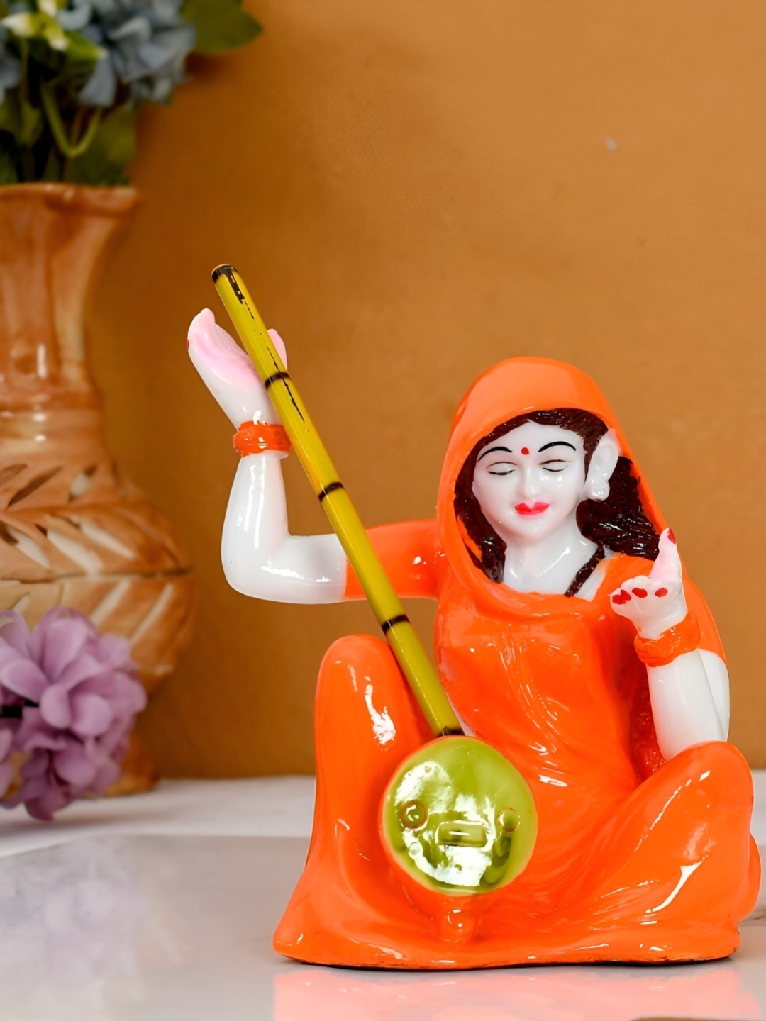 

Craft Junction Orange Meera Bai Showpieces