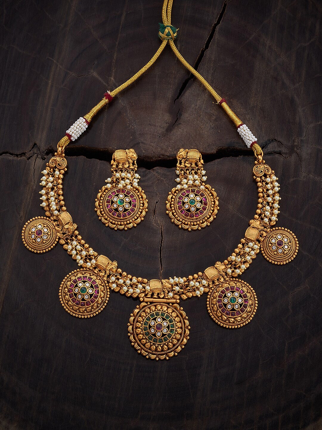 

Kushal's Fashion Jewellery Gold Plated Stones Studded & Beaded Antique Jewellery Set