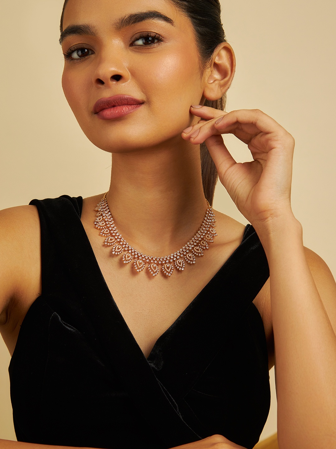 

Kushal's Fashion Jewellery Copper Gold-Plated Cubic Zirconia Studded Necklace