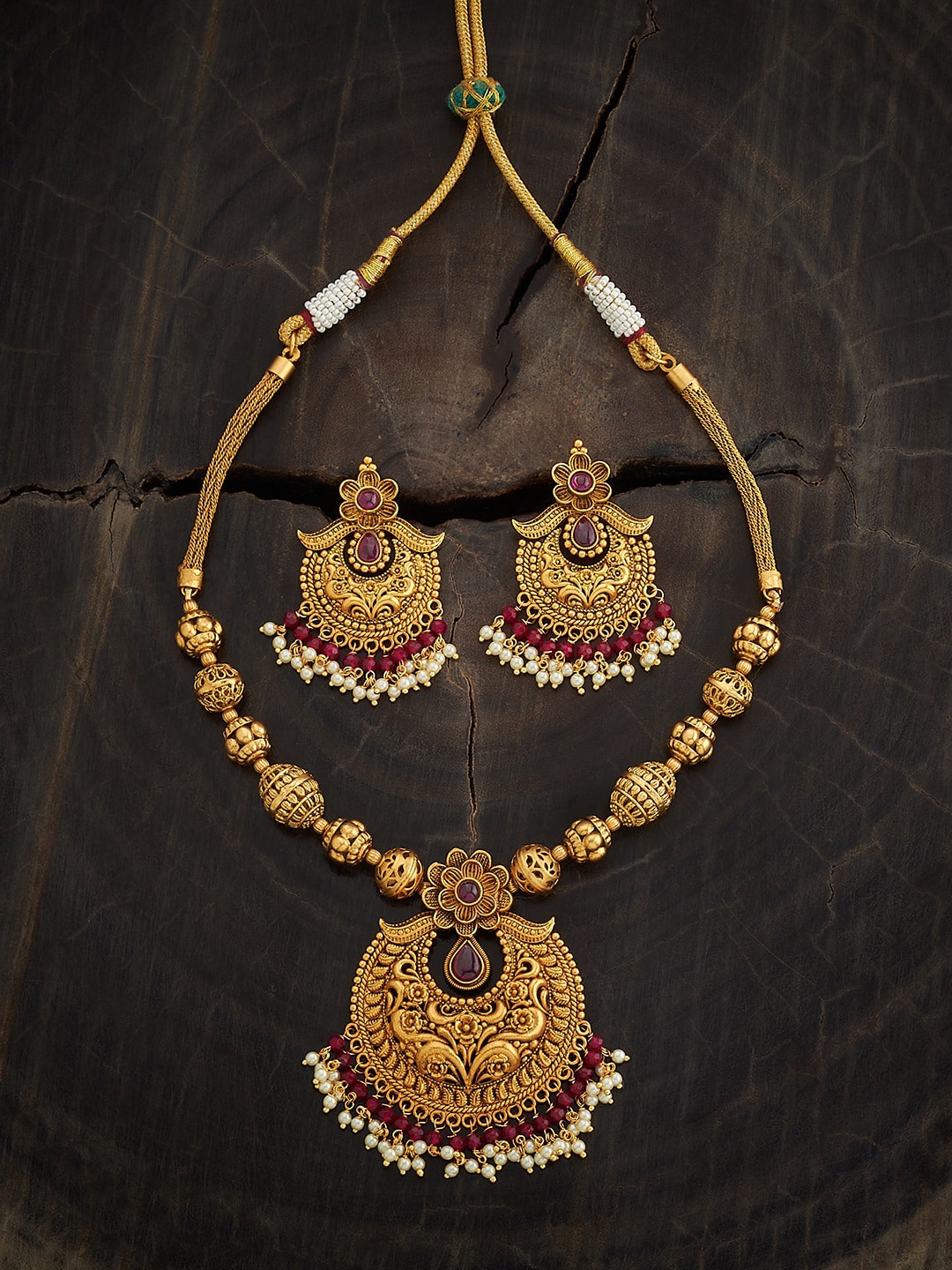 

Kushal's Fashion Jewellery Gold Plated Stones Studded Ethnic Antique Jewellery Set