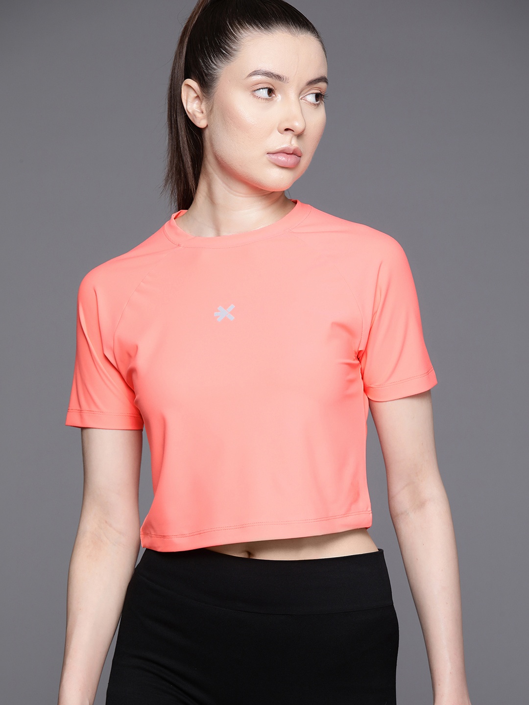 

HRX by Hrithik Roshan Women Solid Regular Fit Crop T-shirt, Coral