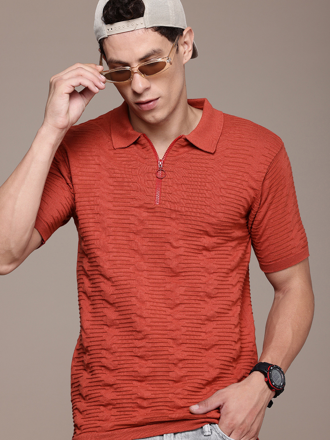 

Roadster Men Self Design Polo Collar T-shirt, Rust