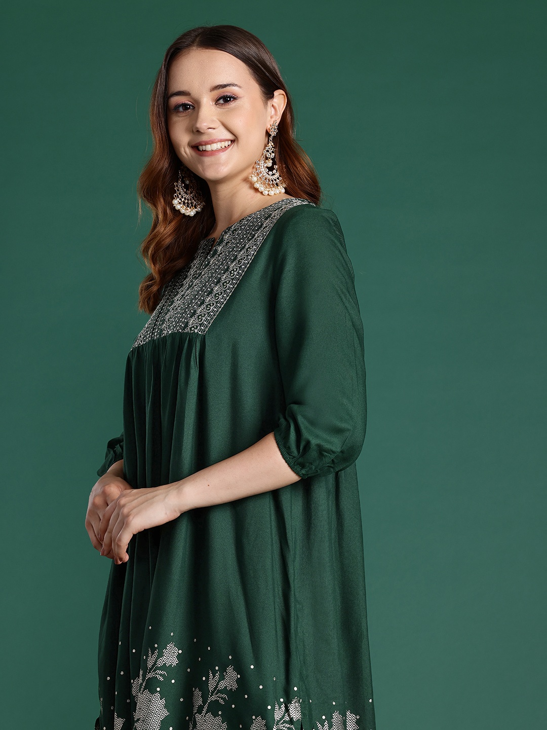 

Sangria Ethnic Motifs Foil Printed Zari Embroidered Pleated Kurta with Trousers, Green