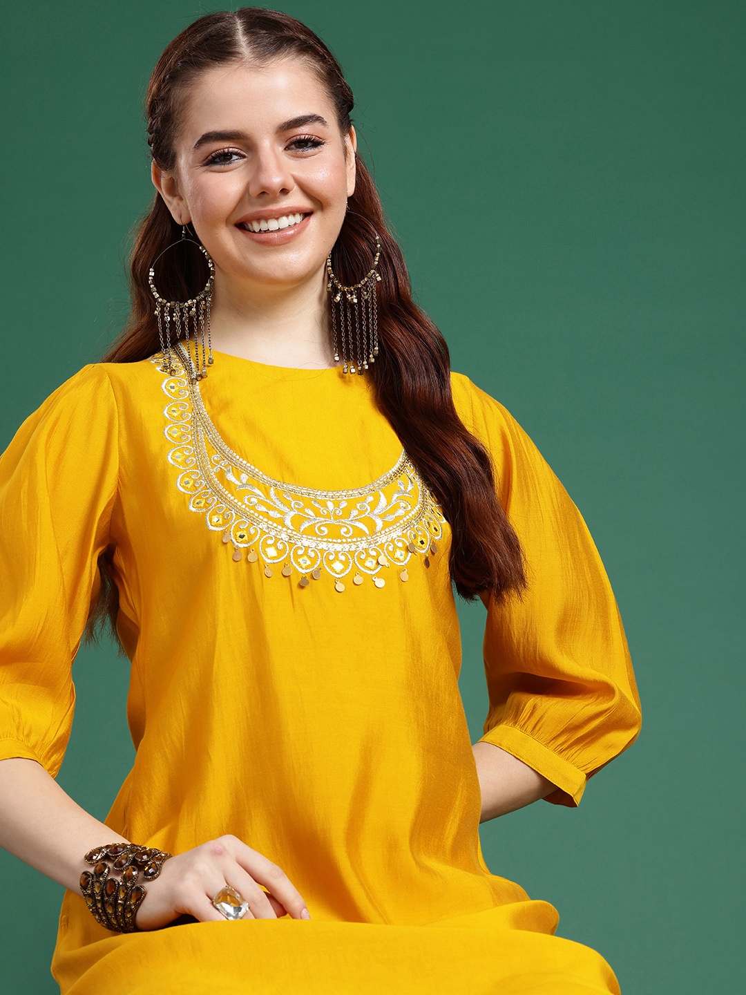 

Sangria Yoke Design Puff Sleeves Thread Work Kurta with Trousers, Mustard