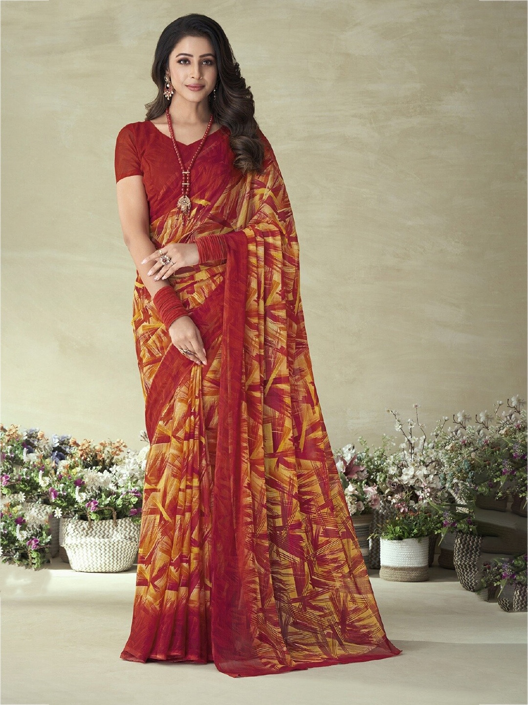

Reboot Fashions Geometric Printed Pure Chiffon Saree, Red