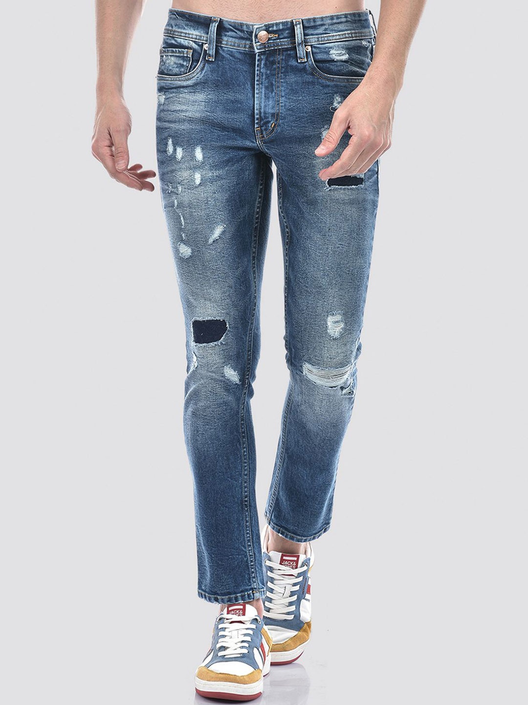 

Numero Uno Men Super Skinny Fit Low-Rise Mildly Distressed Heavy Fade Cotton Jeans, Blue