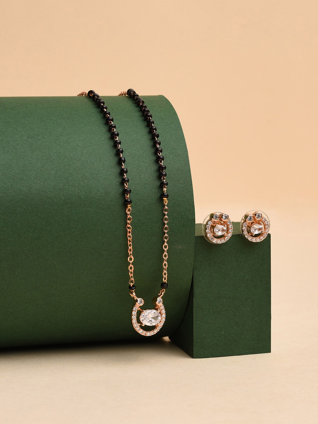 

XPNSV Gold-Plated AD Stone Studded & Beaded Mangalsutra With Earrings