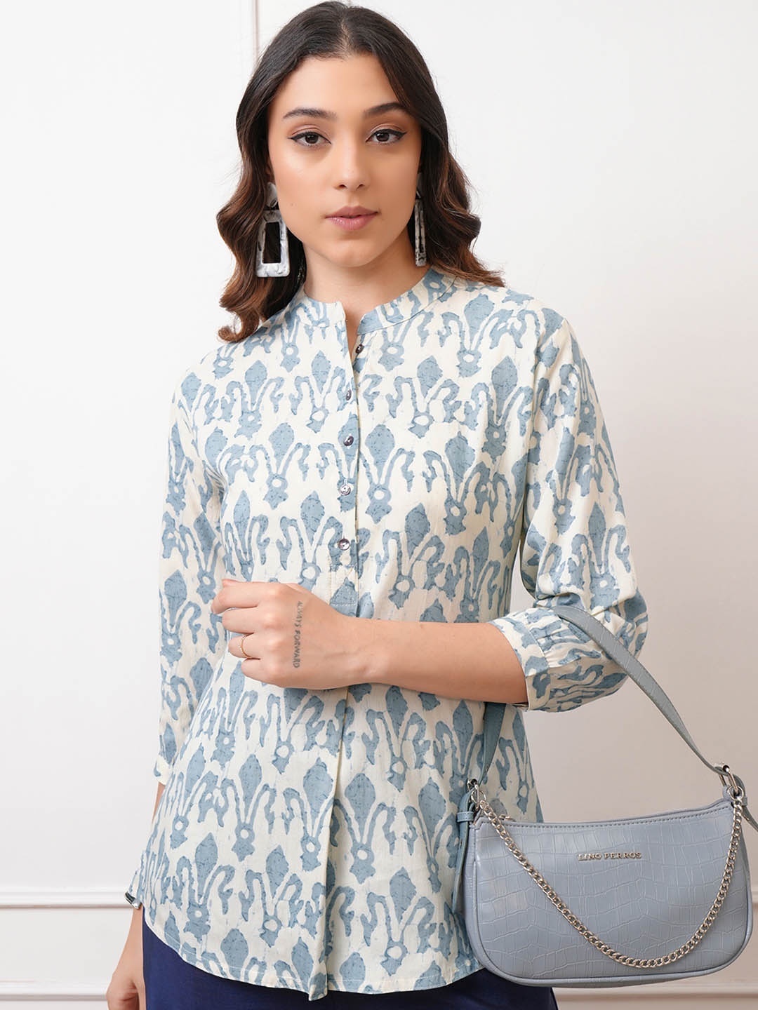 

Vishudh Cream-Coloured Floral Printed Mandarin Collar Puffed Sleeves Shirt Style Top