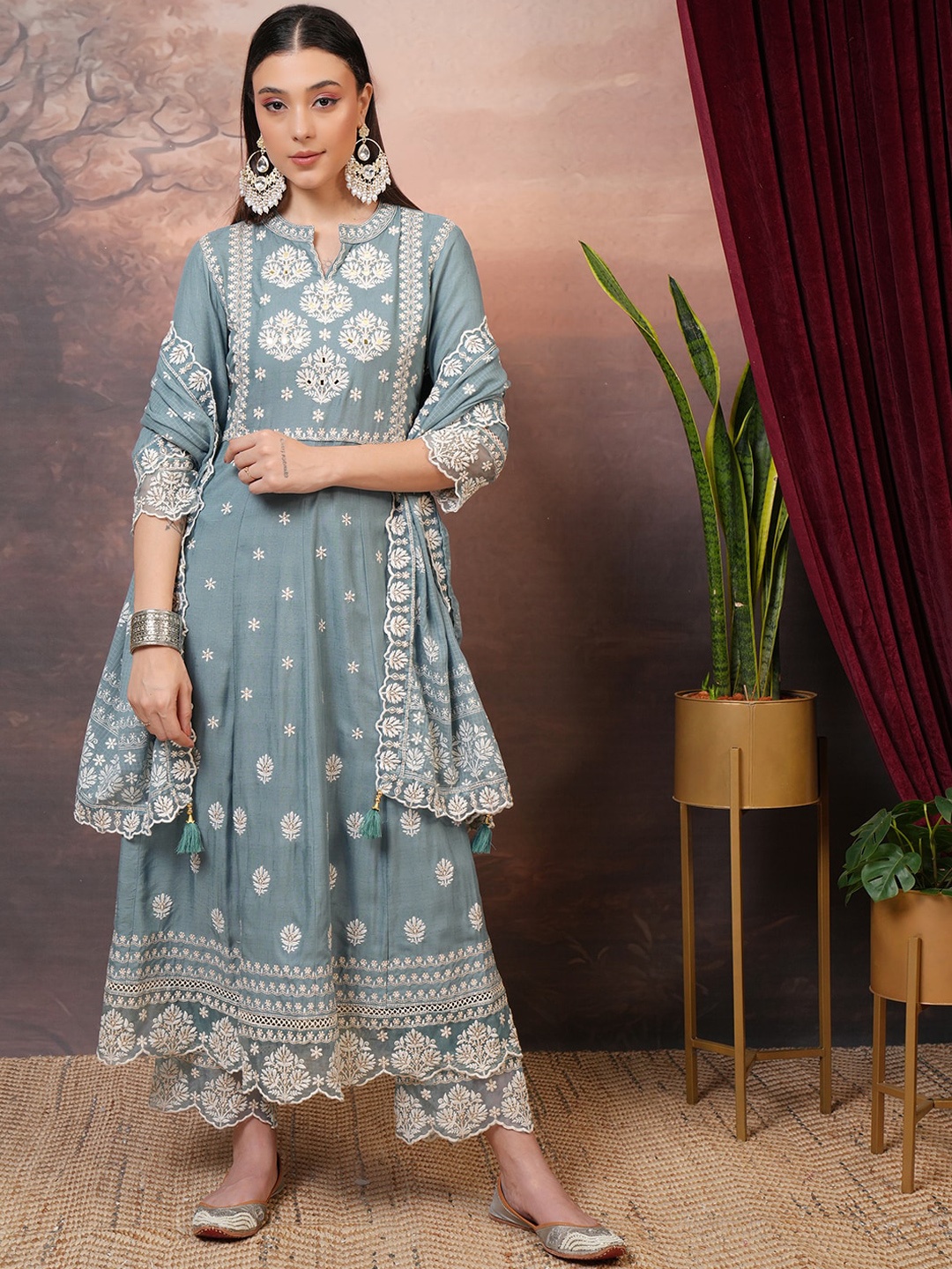 

Vishudh Blue Floral Embroidered Mirror Work Anarkali Kurta With Trousers & Dupatta