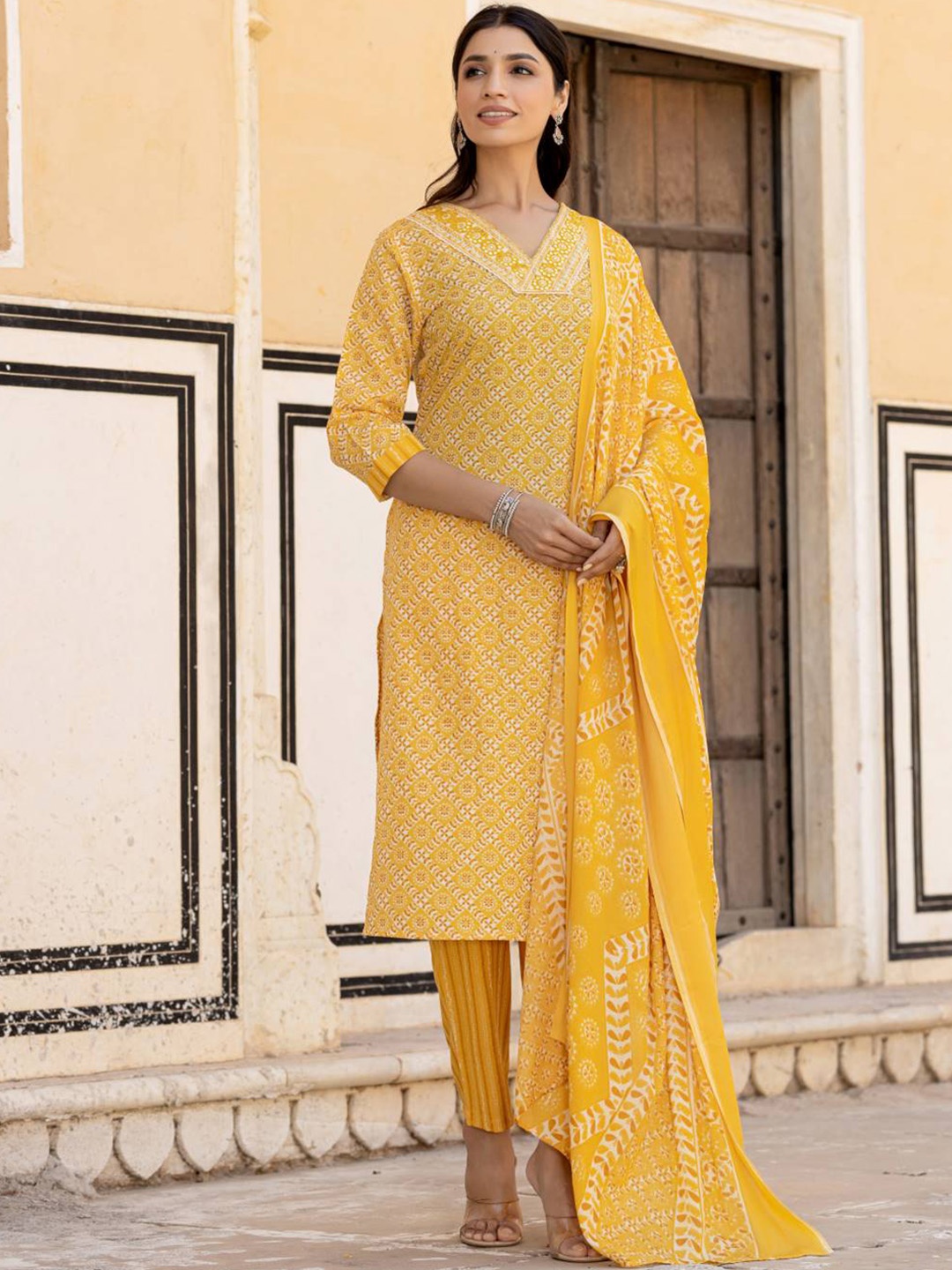 

Varanga Ethnic Motifs Printed Regular Mirror Work Kurta with Trouser & Dupatta, Yellow