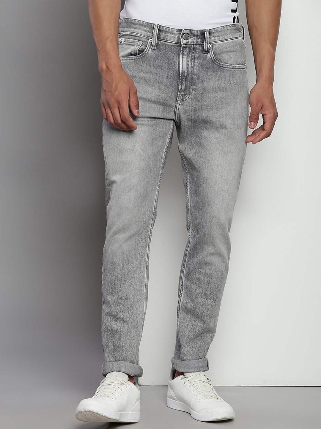 

Calvin Klein Men Slim Fit Heavy Fade Stretchable Jeans, Grey