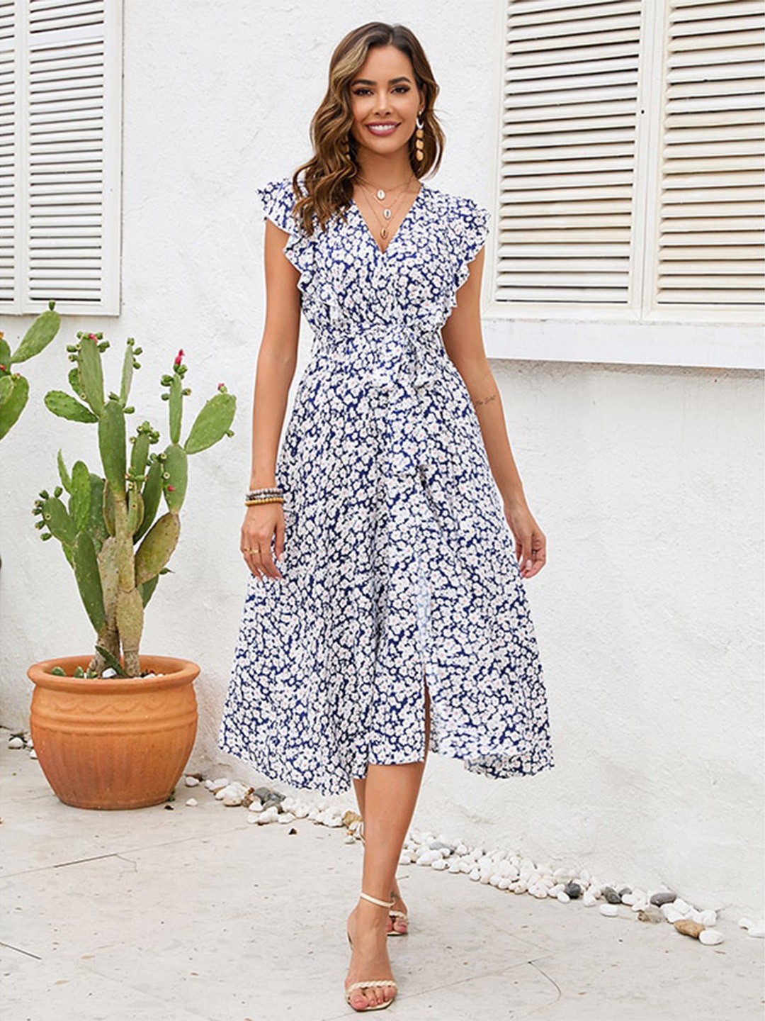 

StyleCast x Revolte Floral Printed Flutter Sleeve Fit & Flare Midi Dress, Blue