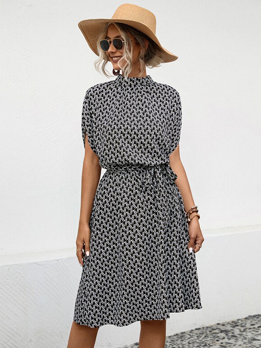 

StyleCast x Revolte Black Polka Dot Printed Mock Neck Fit & Flare Dress