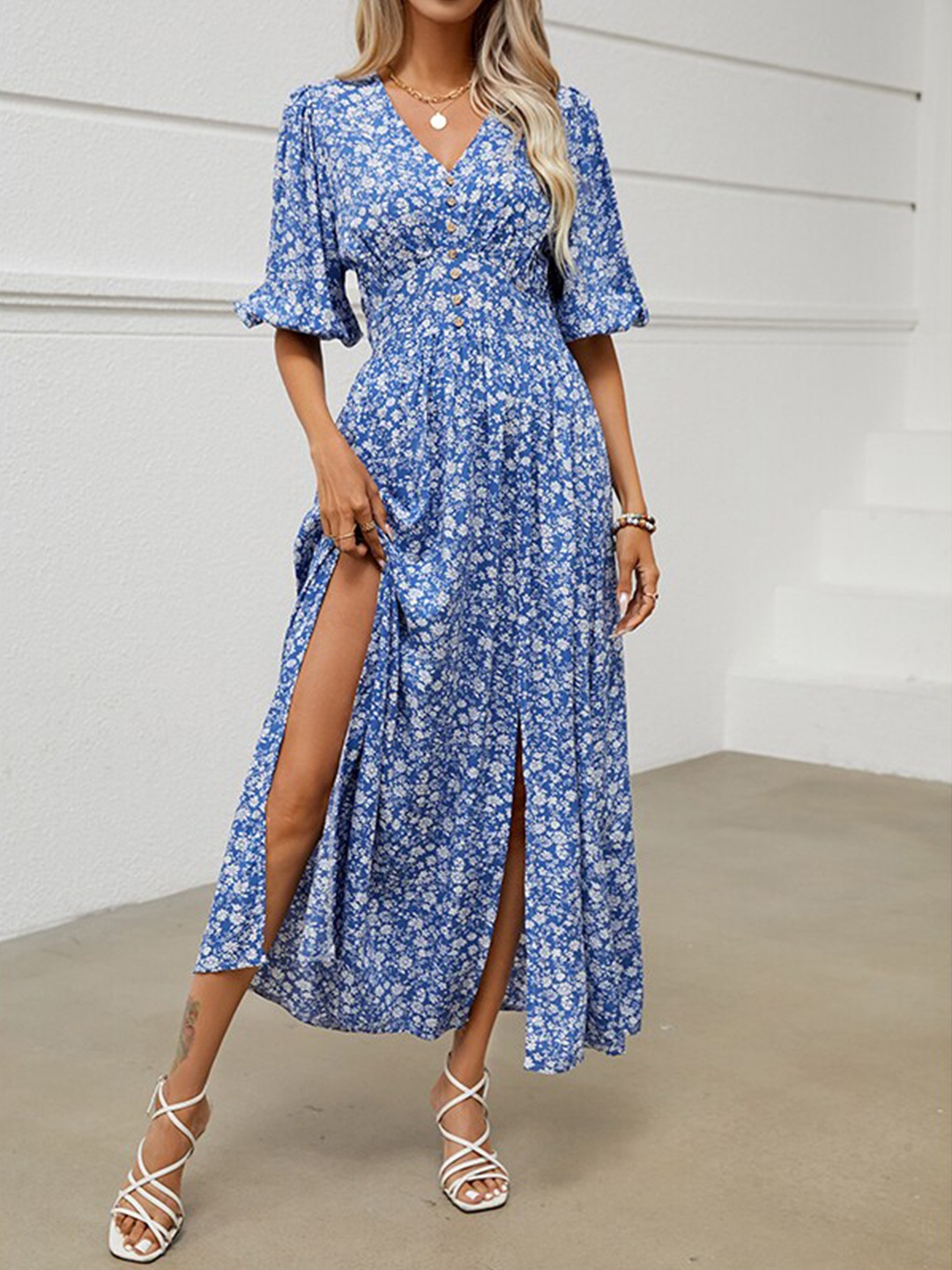 

StyleCast x Revolte Blue & White Floral Printed Flared Sleeve Maxi Dress