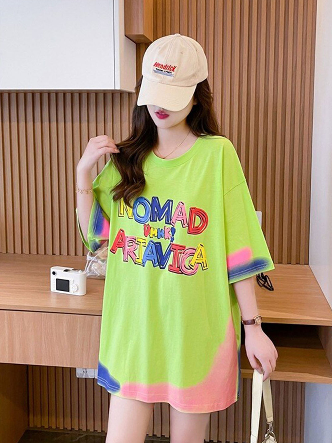 

StyleCast x Revolte Green Printed Cotton Top