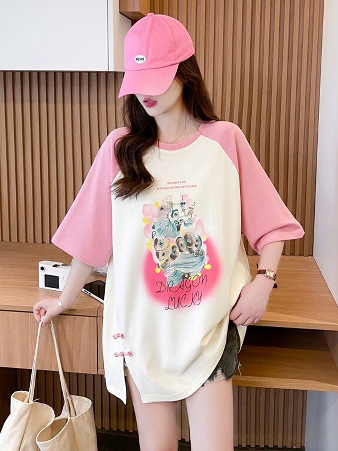 

StyleCast x Revolte Graphic Printed Round Neck Raglan Sleeves Cotton Top, Pink
