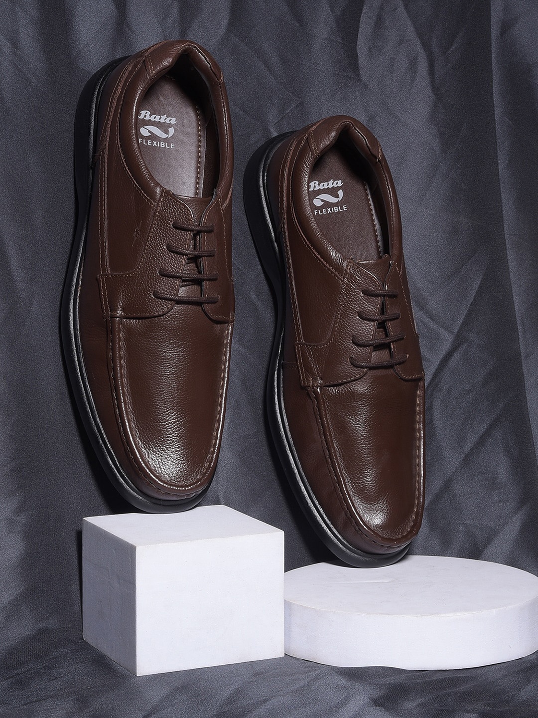 

Bata Men Textured Formal Derbys, Brown