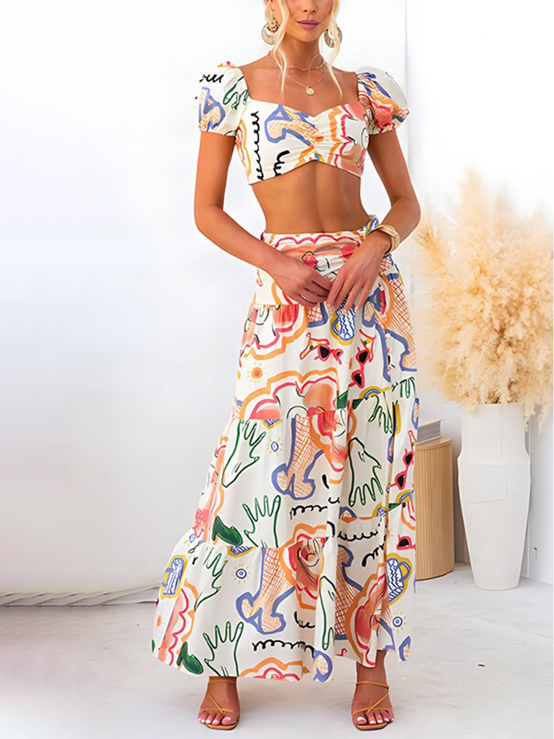 

StyleCast x Revolte Beige & Orange Abstract Printed Top with Skirt