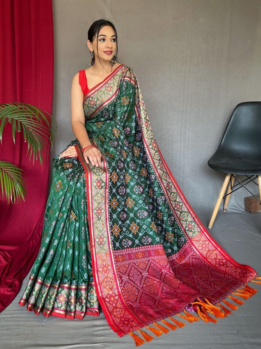 

Sarvada Woven Design Zari Patola Saree, Green