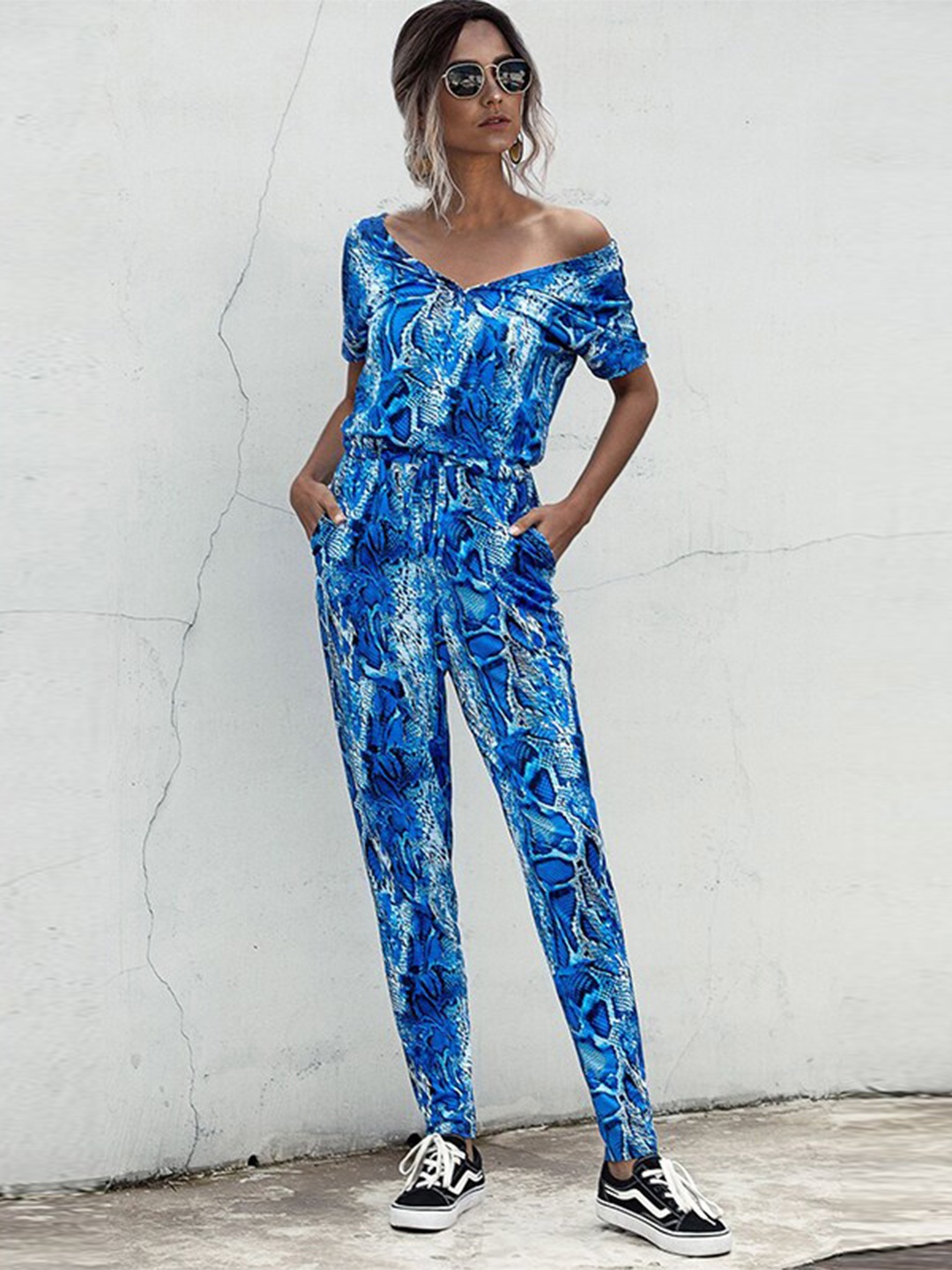 

StyleCast x Revolte Blue Abstract Printed Basic Jumpsuit