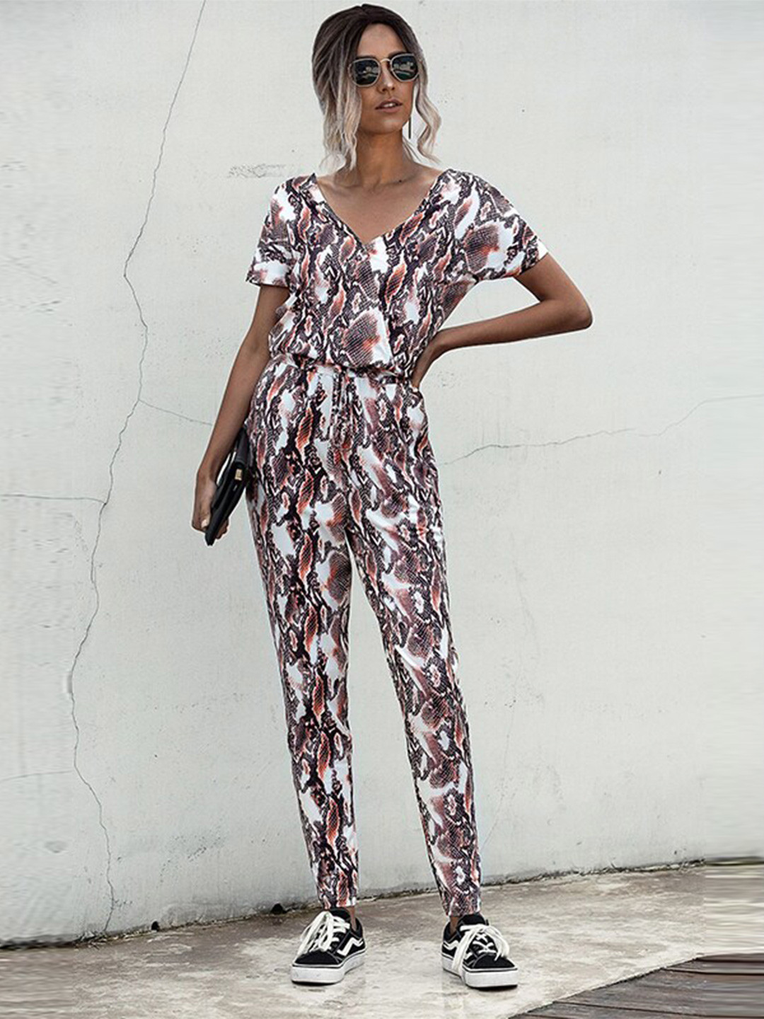 

StyleCast x Revolte Coffee Brown Animal Skin Printed V-Neck Basic Jumpsuit