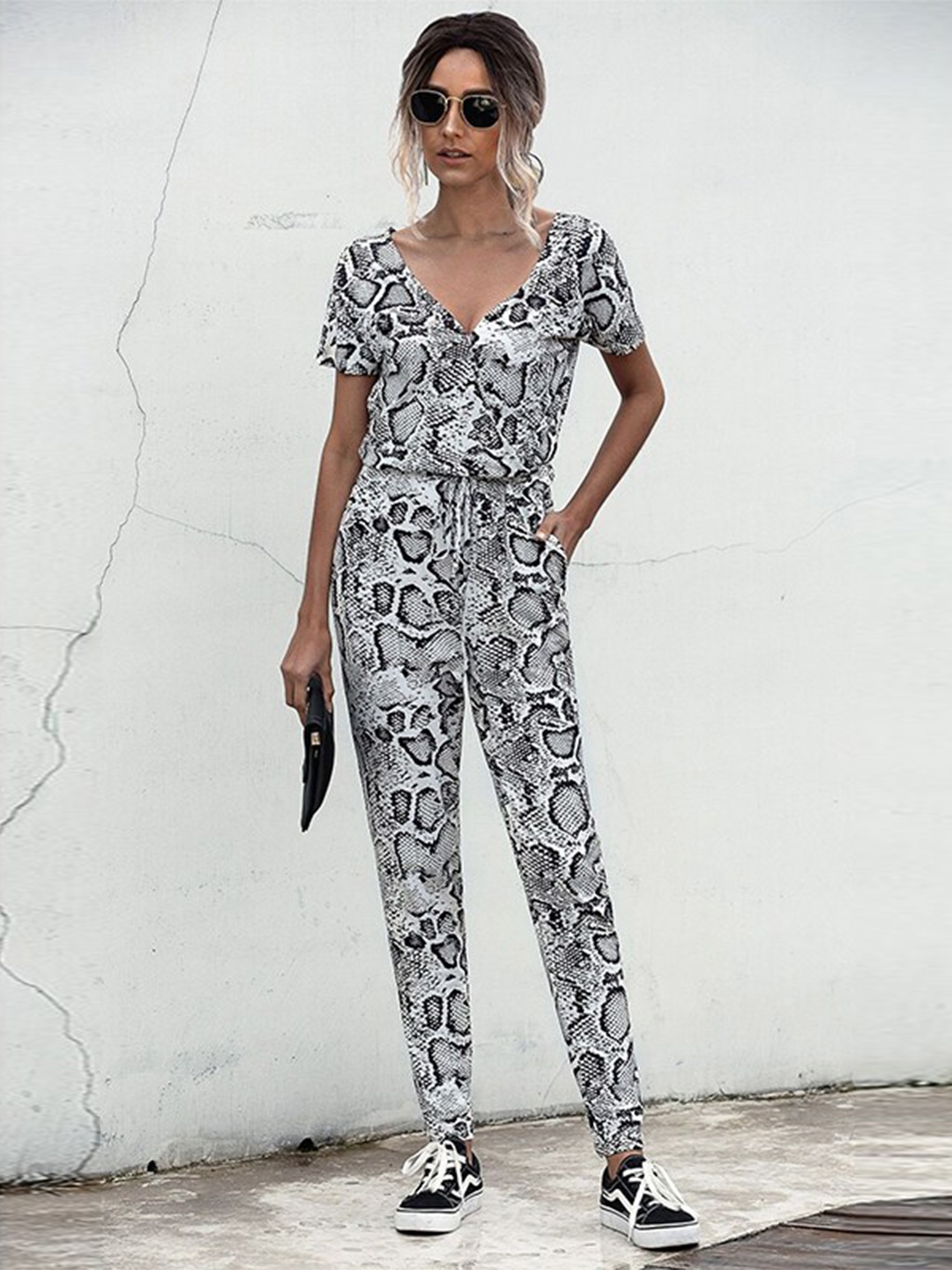 

StyleCast x Revolte Black Animal Skin Printed V-Neck Basic Jumpsuit, Blue