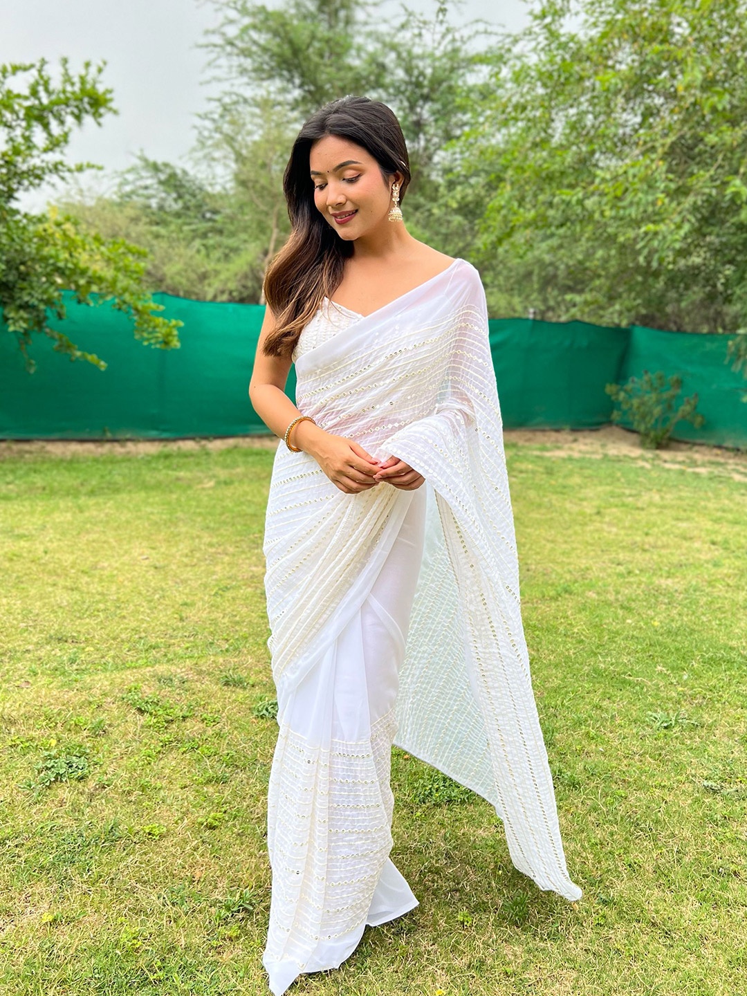 

Mitera Embellished Sequinned Pure Georgette Saree, White