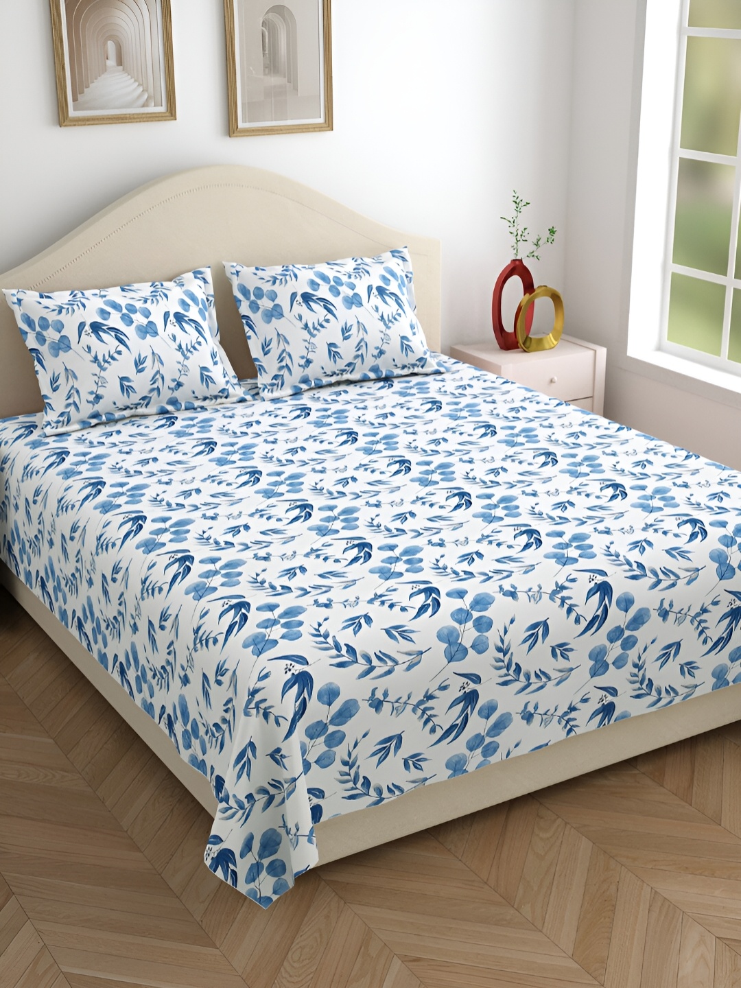 

Aura Blue & White Floral 220 TC King Bedsheet with 2 Pillow Covers