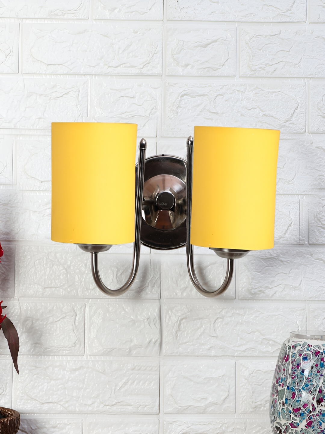 

Devansh Yellow Metal Traditional Cylinder Shaped Wall Lamp