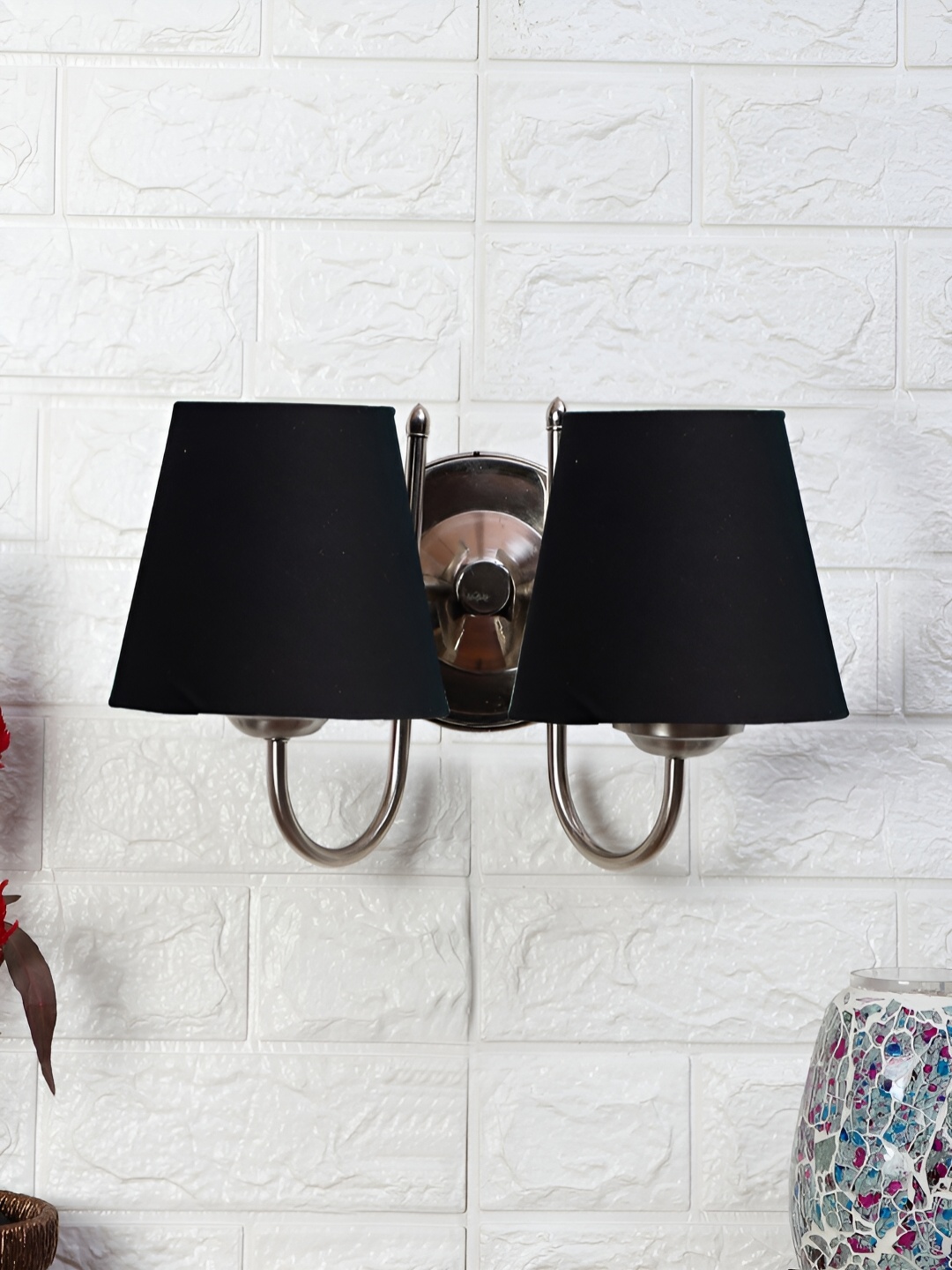 

Devansh Black Metal Traditional Frustum Shaped Wall Lamp