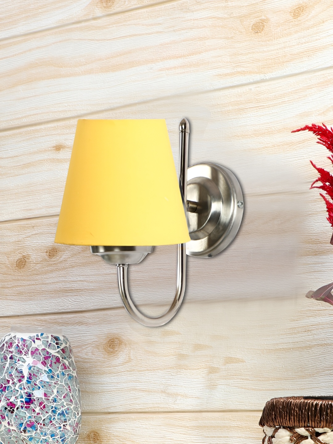 

Devansh Yellow Metal Traditional Frustum Shaped Wall Lamp