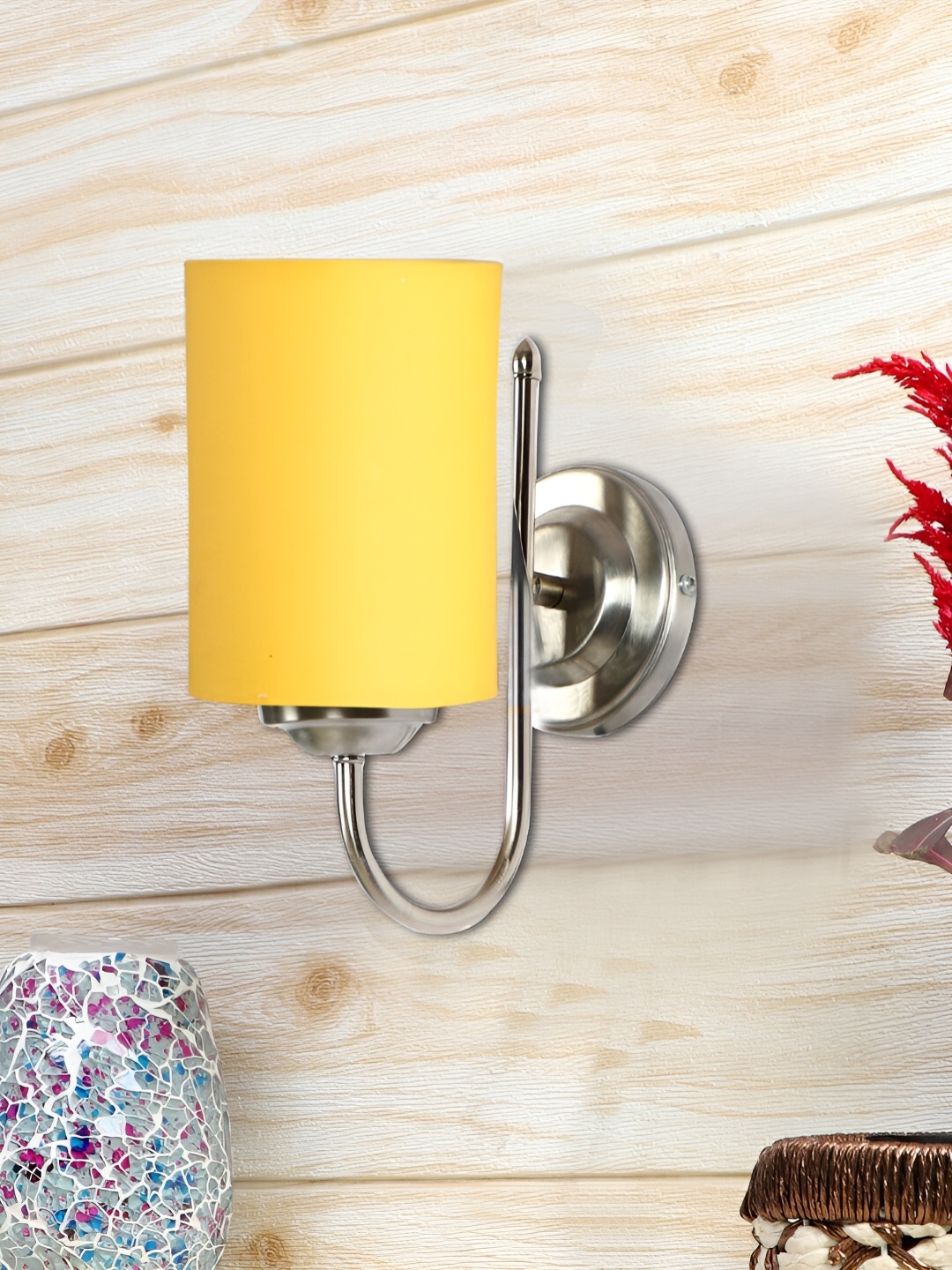 

Devansh Yellow Metal Traditional Cylinder Shaped Wall Lamp