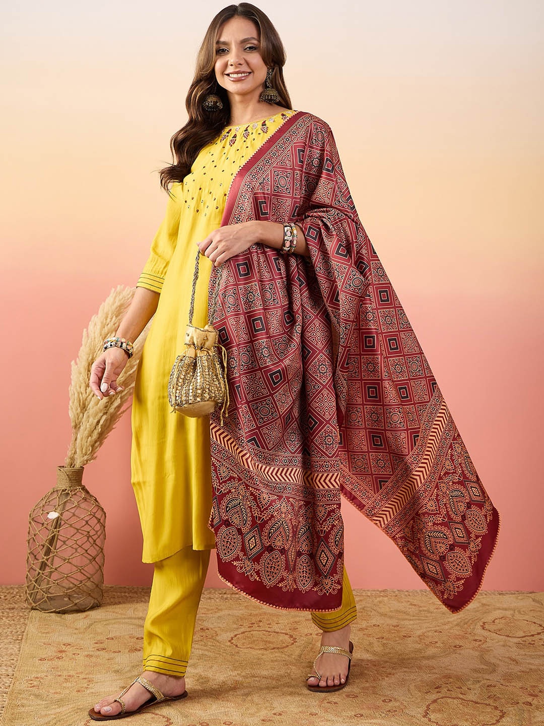

Ariya Prints Floral Yoke Design Thread Work Pure Silk Straight A-Line Kurta Set, Yellow