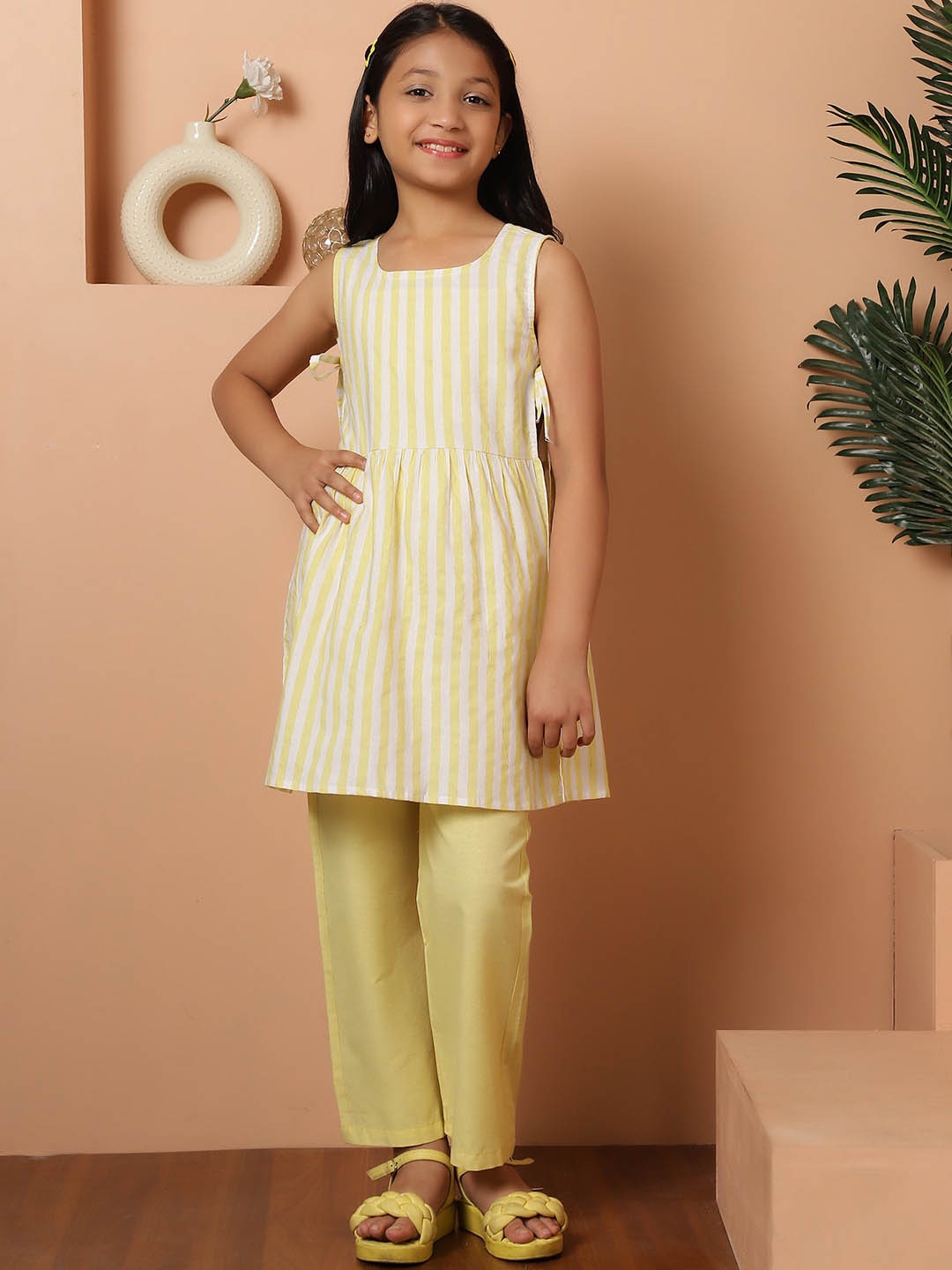 

NEUDIS Girls Striped Regular Pure Cotton Kurti With Trousers And Camisole, Yellow