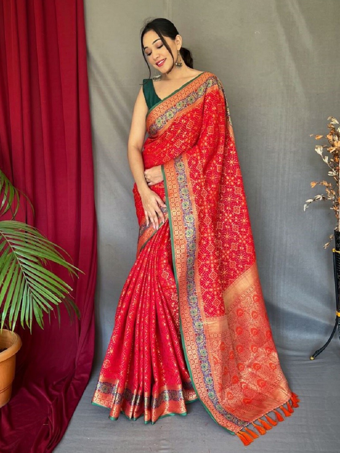 

Sarvada Ethnic Motifs Woven Design Zari Patola Saree, Red