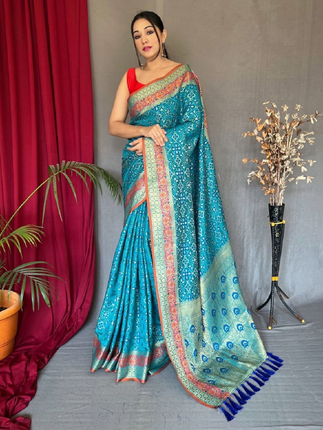 

Sarvada Floral Woven Design Zari Patola Saree, Blue