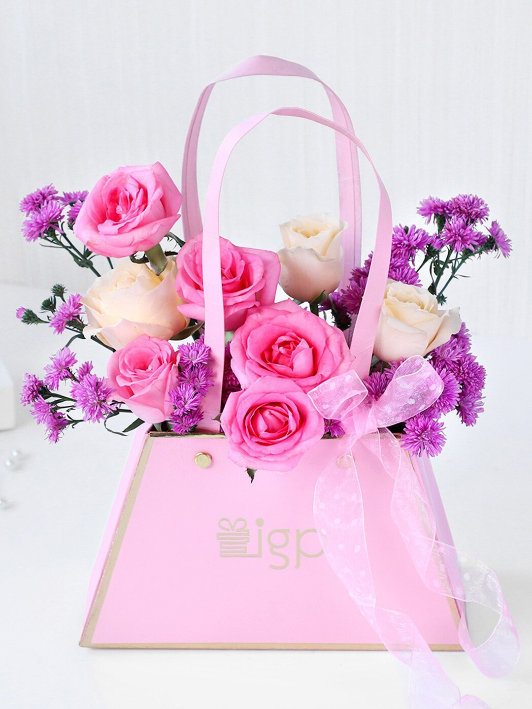 

IGP Rose Fresh Flower in a Pink Flower Bag