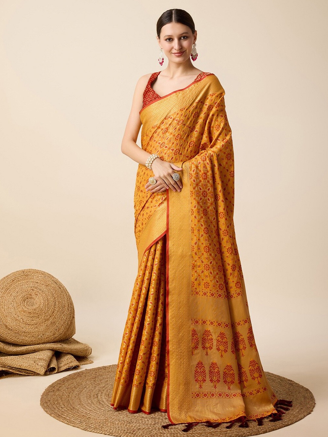 

Nimidiya Woven Design Ethnic Motifs Zari Patola Saree, Mustard