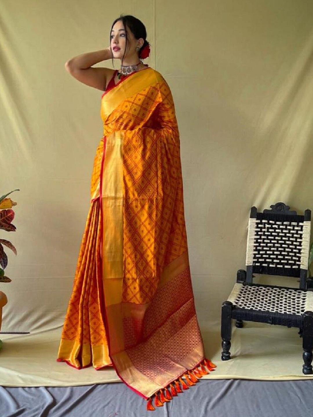 

Nimidiya Woven Design Zari Patola Saree, Mustard