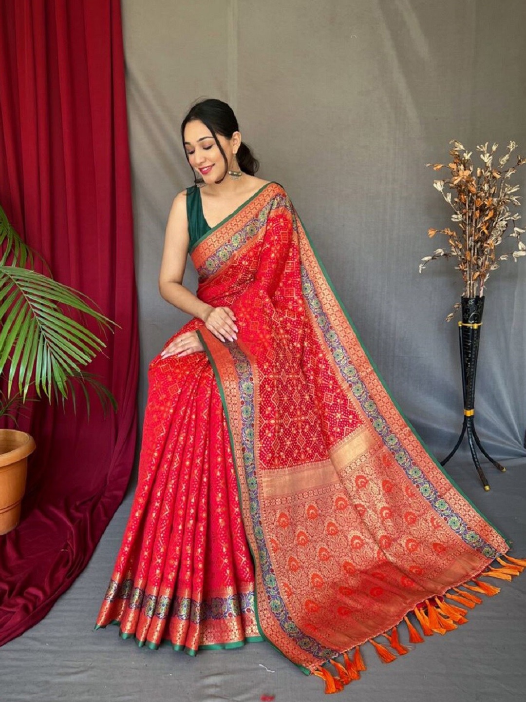 

Nimidiya Woven Design Zari Patola Saree with Tassels, Red