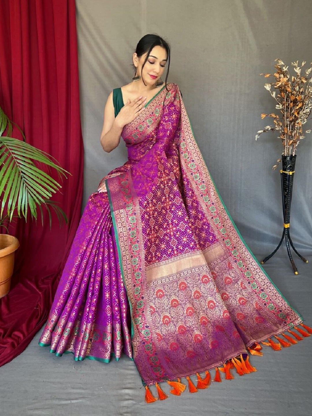 

Nimidiya Woven Design Zari Designer Patola Saree, Purple