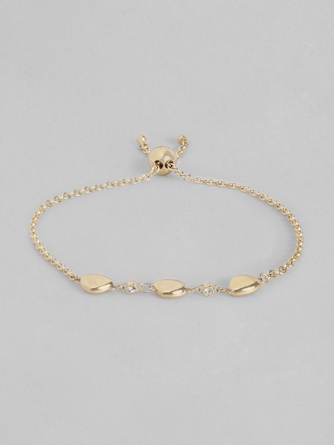 

Calvin Klein Women Brass-Plated Charm Bracelet, Gold