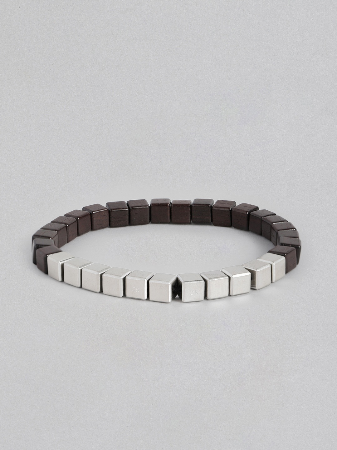 

Calvin Klein Men Brass-Plated Bangle-Style Beaded Bracelet, Brown