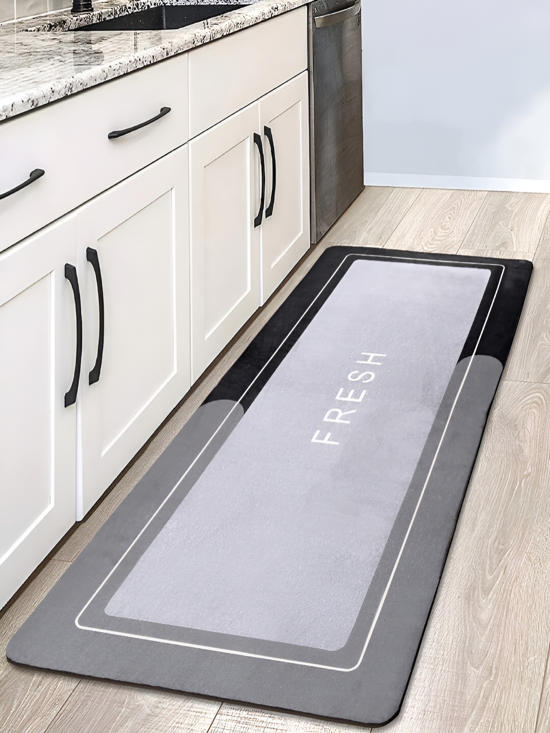 

Saral Home Grey & Black Printed Anti Skid Rectangle Floor Runner