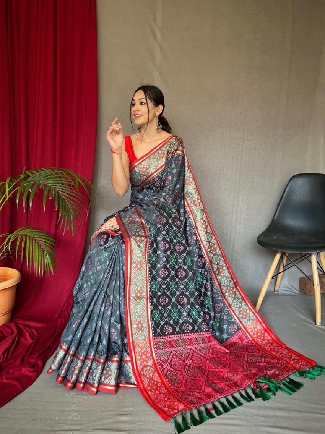 

Mitera Ethnic Motifs Woven Design Zari Patola Saree, Grey