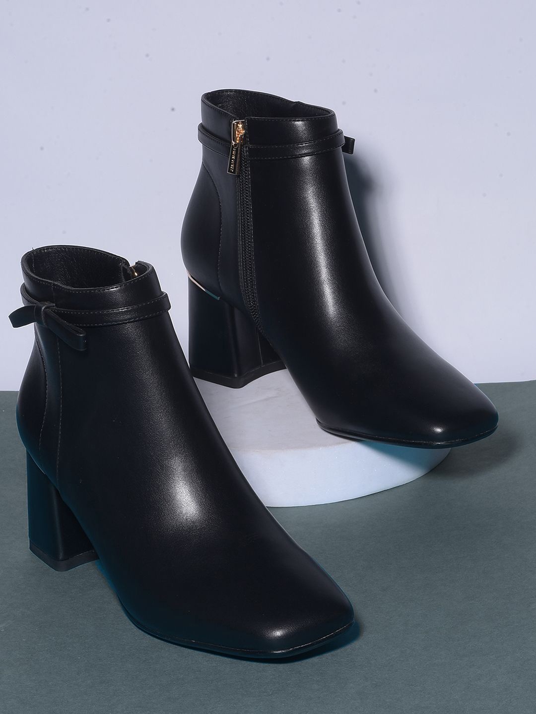 

Nine West Women Pointed Toe Zip Block Heeled Boots, Black