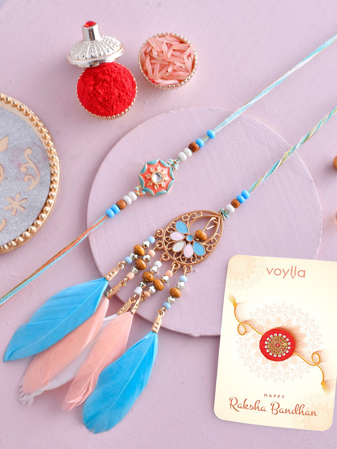 

Voylla Set Of 2 Feathers And Charms Enamelled Bhaiya Bhabhi Rakhi, Blue