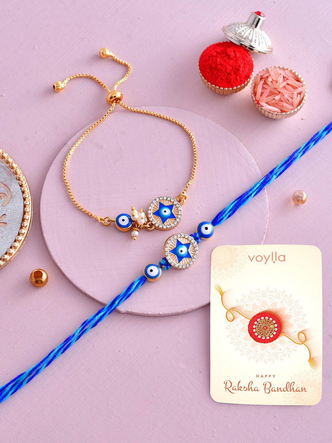 

Voylla Set of 2 Bhaiya Bhabhi Evil Eye Thread And Chain Rakhi, Blue
