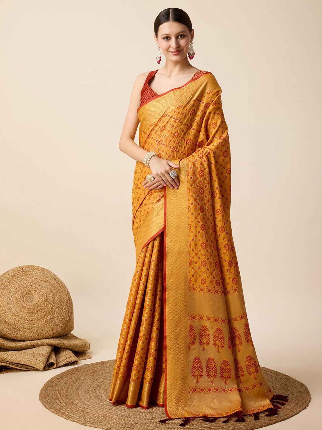 

Mitera Ethnic Motifs Woven Design Zari Patola Saree, Mustard