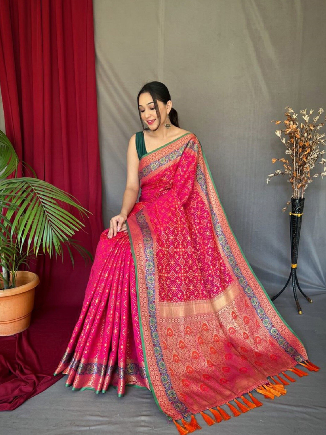

Mitera Ethnic Motifs Woven Design Zari Patola Saree, Pink